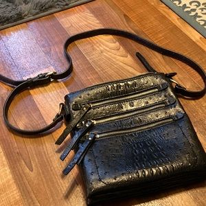 Gorgeous black pebbled leather style crossbody. Multiple compartments